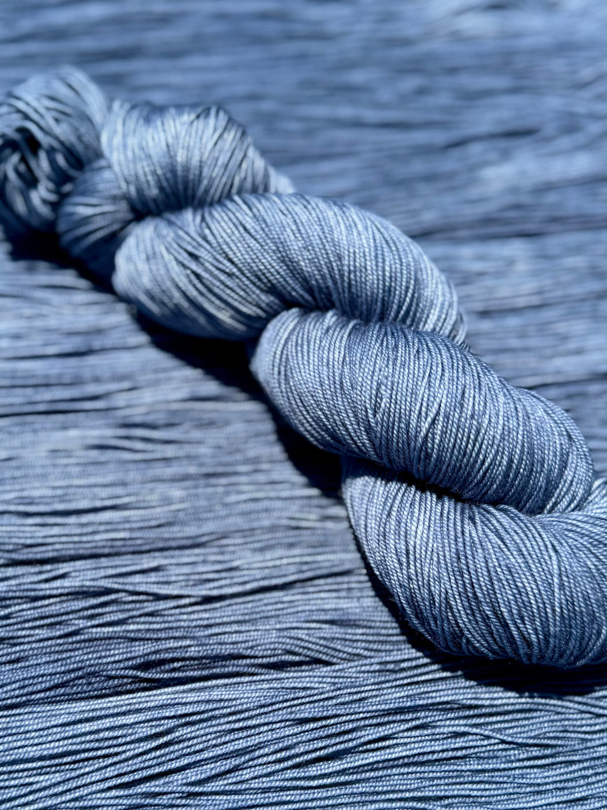 Last Light hand-dyed sock yarn in deep blue